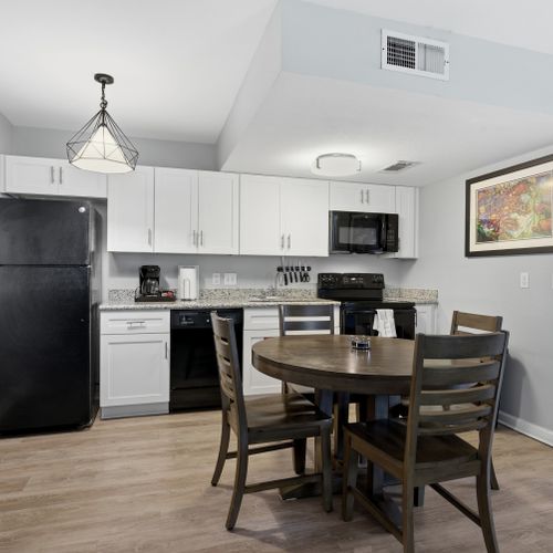 Fully equipped kitchen & dining area ready for home-cooked meals.