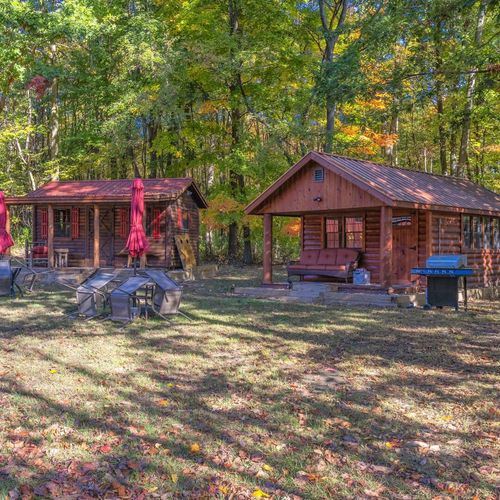 EXTERIOR:  The 2 cabins plus the outdoor grill and outdoor dining tables.