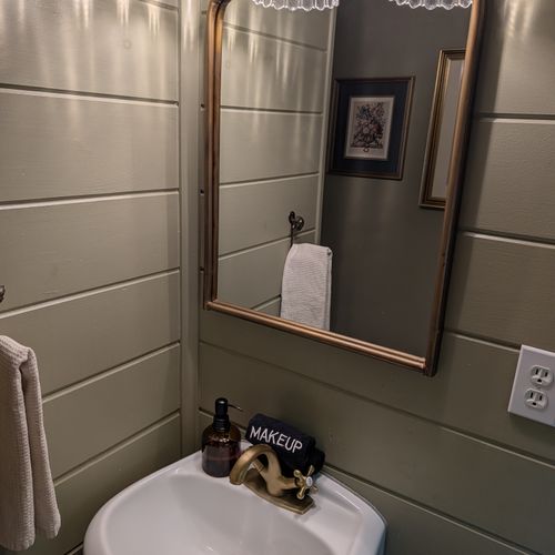 BATHROOM:  The cabin has a full bathroom with a walk-in shower.  Please note that the shower is quite small as it is only 25" x 27" in size.  As such, it may be difficult for larger individuals to use the shower.