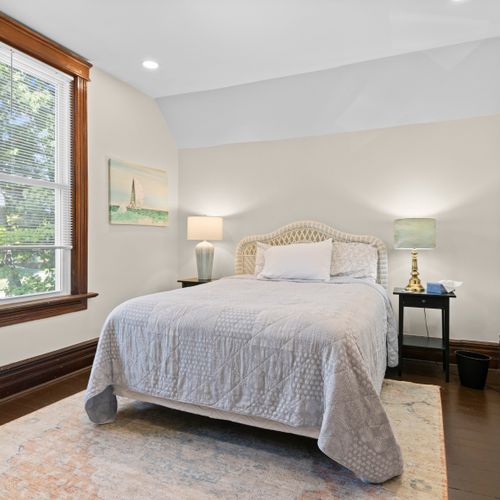 BEDROOM #4 (SECOND FLOOR) - HOUSE: Features a queen-size bed, dresser, television, nightstands, and a closet