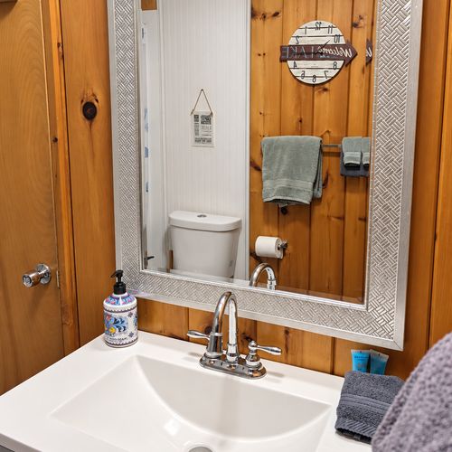 BATHROOM:  The home has a full-size bathroom with a walk-in shower.