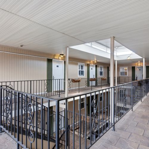 Stairs end and gallery walkway to your suite