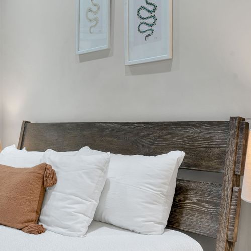 Reclaimed wood headboard with rustic charm