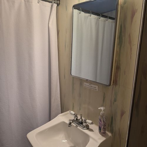 BATHROOM #2 (SECOND FLOOR):  Full bathroom with a combination tub and shower on the second floor.