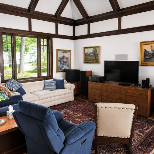 LIVING ROOM:  The home has a huge and very comfy and family-friendly living room with a large wood fireplace.