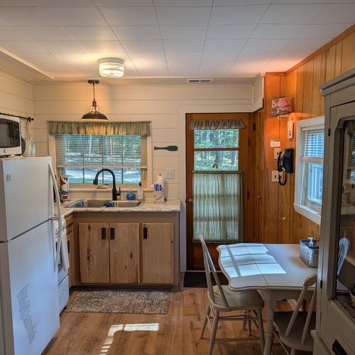 KITCHEN:  The home has a full kitchen with all appliances except a dishwasher.  Note that there is a breakfast table as well.