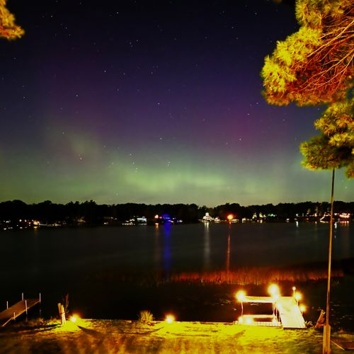 OVERVIEW:  Looking at the northern lights from the backyard at night.