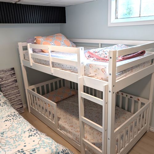 BEDROOM #3 (LOWER LEVEL):  Features a full-size bed, bunk bed, and a foosball table.