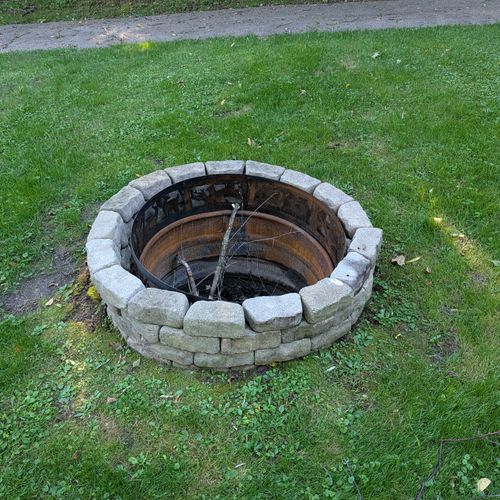 EXTERIOR:  The backyard bonfire ring