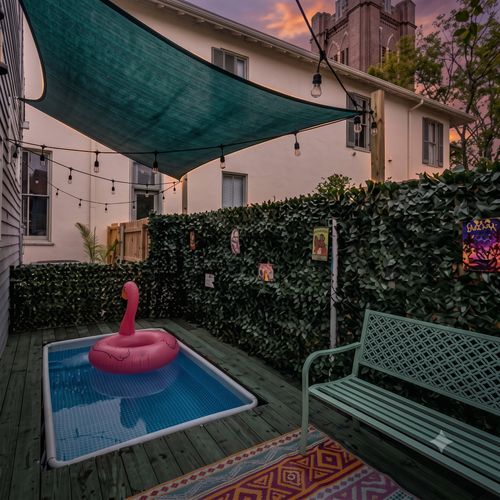 Private plunge pool w/ a pink flamingo float — fun & ready to enjoy.
