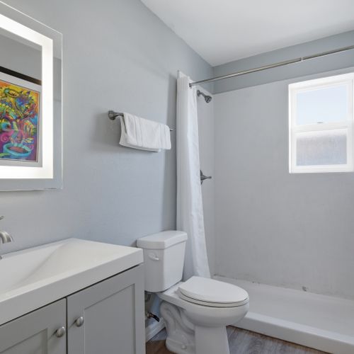 Unit 205 bathroom stocked w/ essentials & ready to refresh.