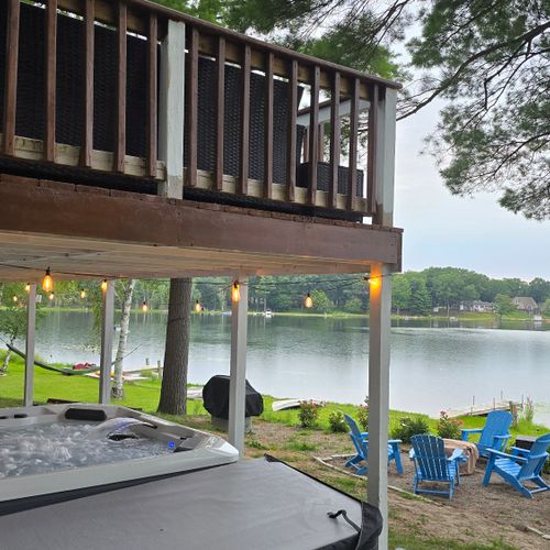 EXTERIOR:  The incredible new 6-person hot tub, with a great view of Bass Lake from the hot tub!