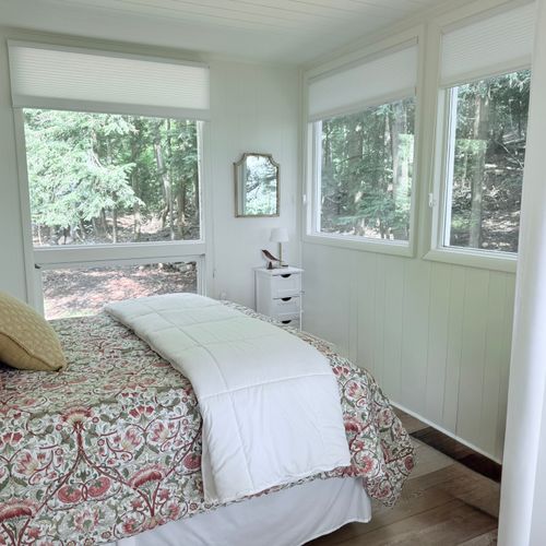 BEDROOM:  The home has a truly gorgeous bedroom with great views of nature, but with blinds on all windows