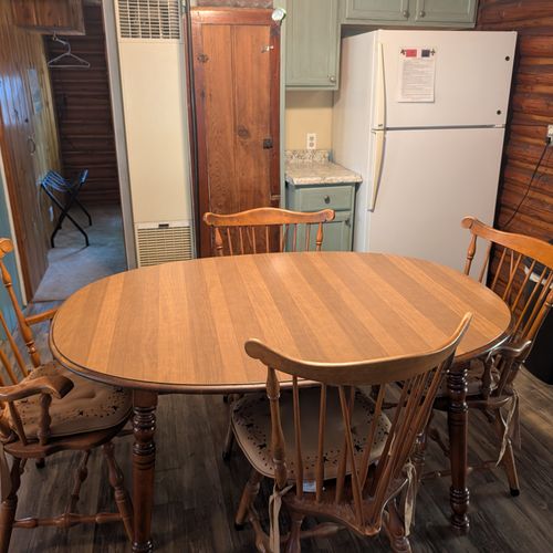 DINING AREA:  There is a cute dining table with seating for 4 adults in the middle of the kitchen.