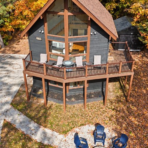 EXTERIOR:  Another aerial photo of the front of the chalet in the Fall.
