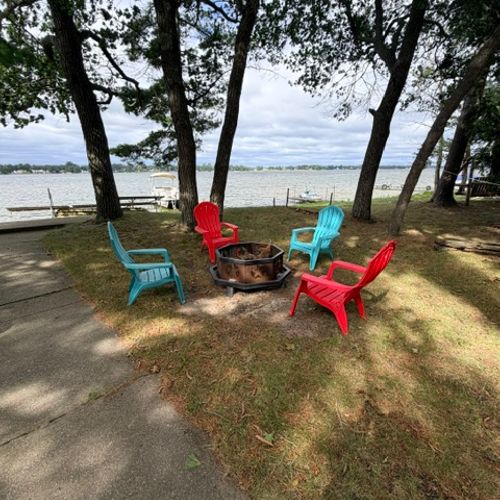 EXTERIOR:  The bonfire ring with Van Etten lake in the background