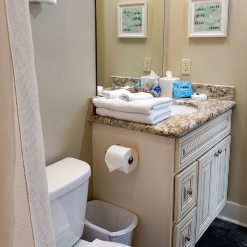 Modern bathroom vanity with granite countertop and ample storage
