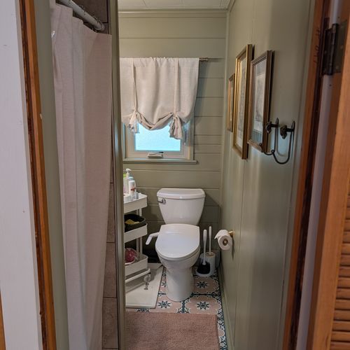 BATHROOM:  The cabin has a full bathroom with a walk-in shower.  Please note that the shower is quite small as it is only 25" x 27" in size.  As such, it may be difficult for larger individuals to use the shower.