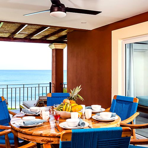Covered oceanview terrace dining table for six at Mar Azul, Playa Langosta, Tamarindo, Costa Rica.