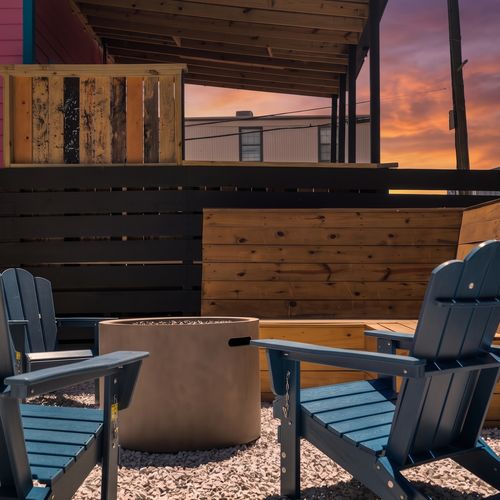 Artsy urban courtyard w/ firepit & local murals — your go-to outdoor hangout.