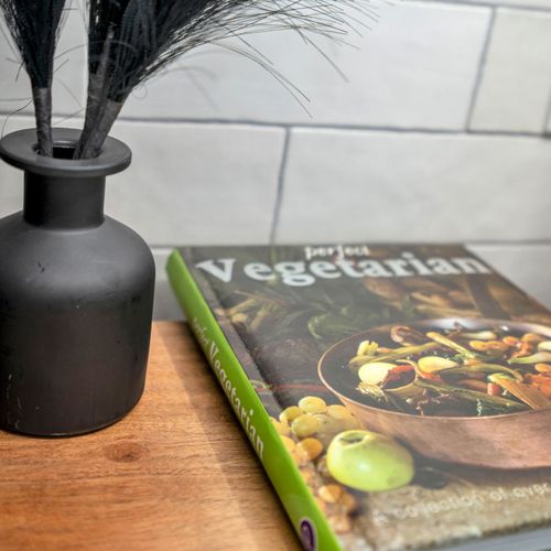 Thoughtful touches like a vegetarian cookbook to inspire your next home-cooked meal