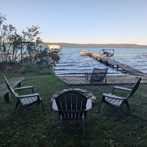 EXTERIOR:  The private bonfire ring right on Crystal Lake!