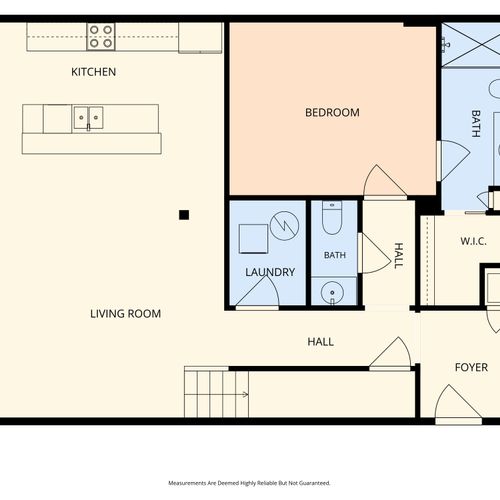 First floor layout with living, kitchen, and laundry