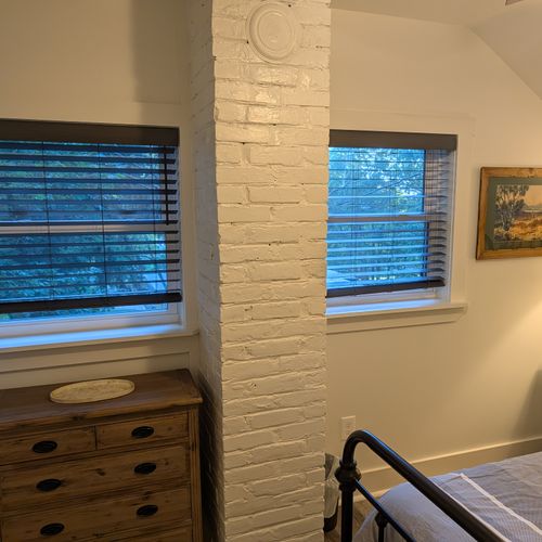 BEDROOM #2 (SECOND FLOOR):  Features a queen-size bed, nightstand, lamp, dresser, mirror, closet, and ceiling fan.