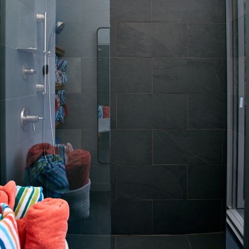 The shower room off the pool deck, perfect for a rinse after swimming.