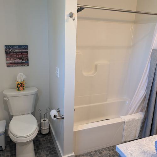 BATHROOM #2 (THIRD FLOOR):  Full bathroom with a combination tub and shower.  Note that the laundry closet is also in a closet within this bathroom.