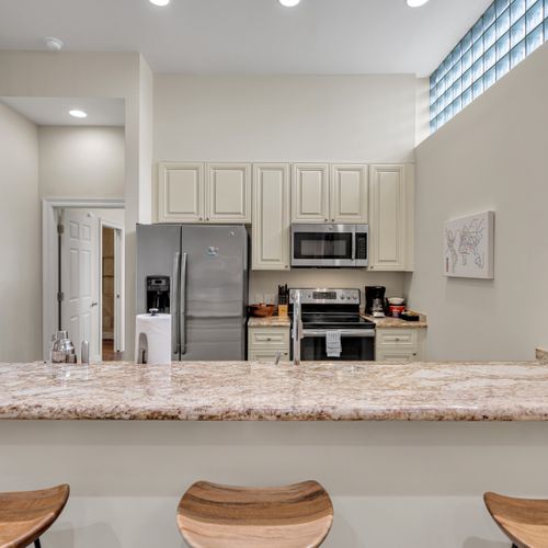 Chef-ready kitchen with sweeping granite counters