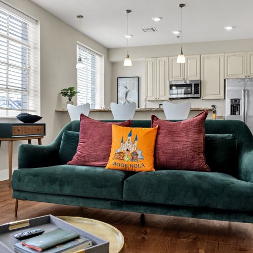 Emerald velvet sofa with bold pops of color