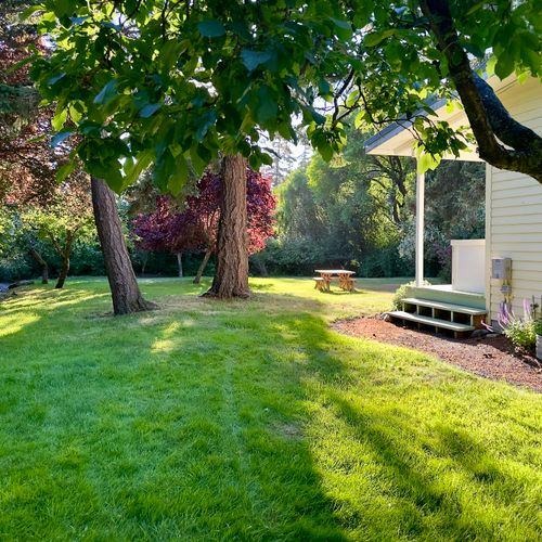 Enjoy a large, peaceful backyard with plenty of room to relax, play, or dine outdoors.