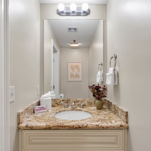 Bright vanity with a pop of wall art