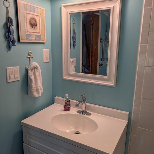 BATHROOM:  The cabin has a very cute and recently-updated full bathroom