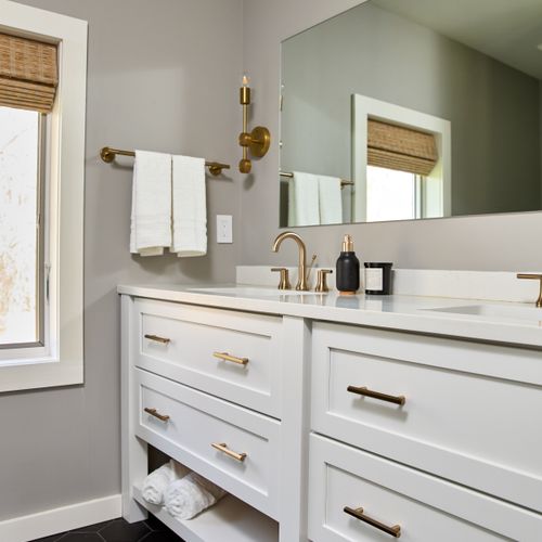 The ensuite bathroom of the primary bedroom in the main house.