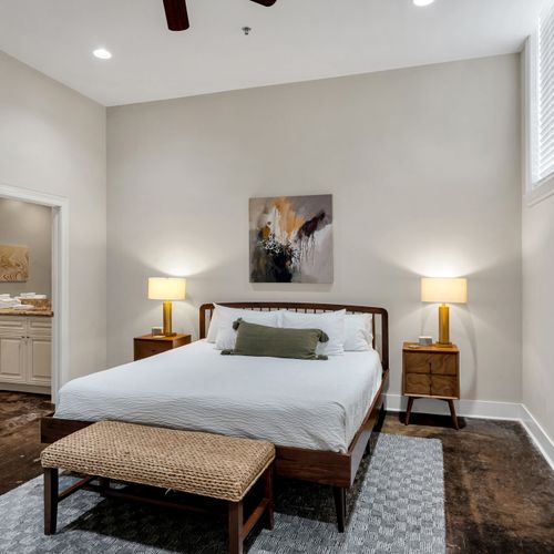 King bed with a bench for your bags