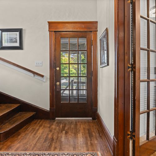 FRONT FOYER - HOUSE: The main entrance and the front foyer of the house, with the entrance to Bedroom #2 at the right of the photo