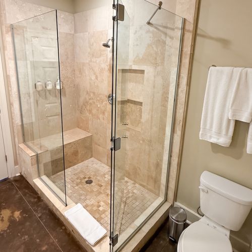 Glass-enclosed walk-in shower