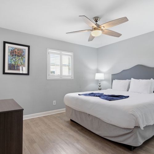 Unit 304 – Calm, light-filled bedroom w/ a king bed for a great night's rest.