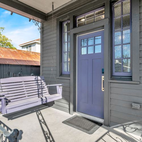 Swing gently on the front porch & watch the neighborhood go by