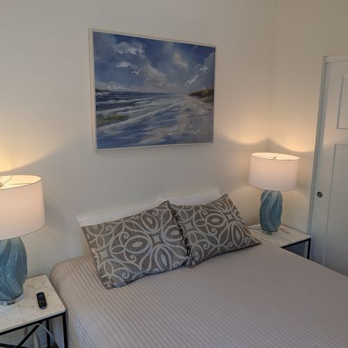 LIVING SPACE - APARTMENT: The comfy full-size bed with a closet and smart TV. Perfect for relaxation!