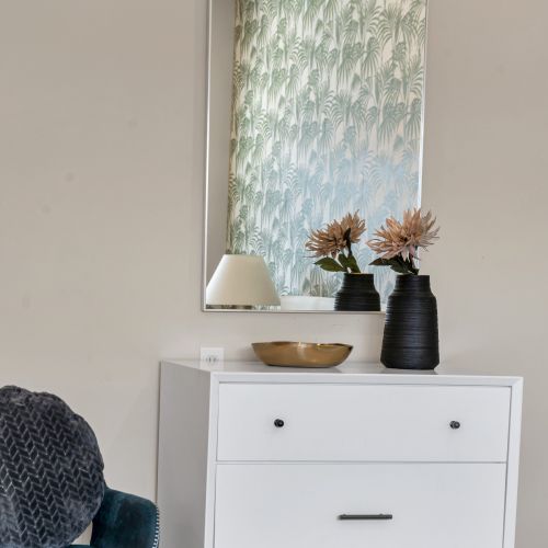 White dresser with dried florals and fresh style