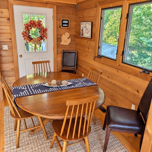 DINING AREA (SECOND FLOOR):  The home has a cute dining area next to the kitchen, with seating for up to 6 adults.