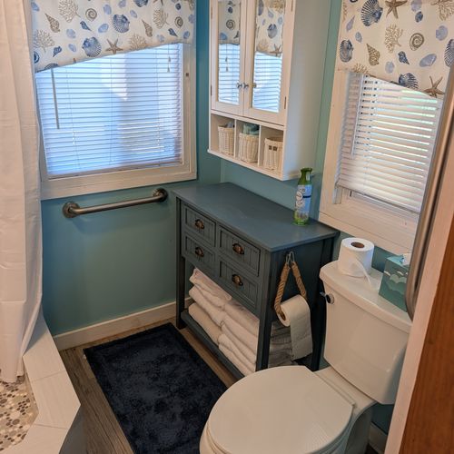 BATHROOM:  The cabin has a very cute and recently-updated full bathroom