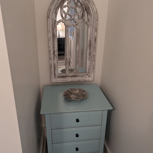 BEDROOM #1 (SECOND FLOOR):  Features a queen-size bed, nightstands, lamps, dresser, mirror, closet, and ceiling fan.
