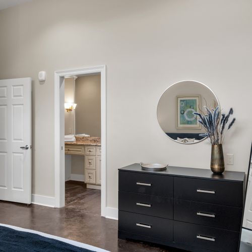 Black dresser leading to your private ensuite