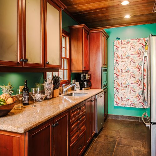 Fully equipped gourmet kitchen with modern appliances, custom cabinetry, and coastal design at a luxury Tamarindo vacation rental in Costa Rica. Open layout ideal for family meals, entertaining, extended stays, and beach living in Langosta Beach.
