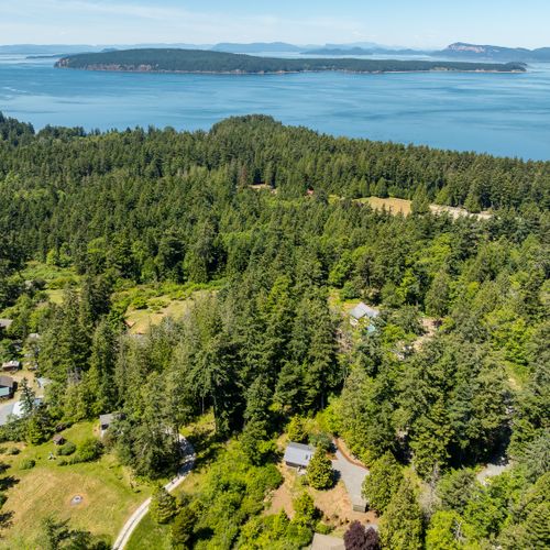 Surrounded by forest and water, this peaceful retreat offers the best of island living