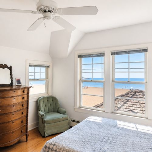 BEDROOM #2 (SECOND FLOOR):  Gorgeous second floor bedroom with a queen bed and incredible views of Lake Michigan and the Frankfort Lighthouse!